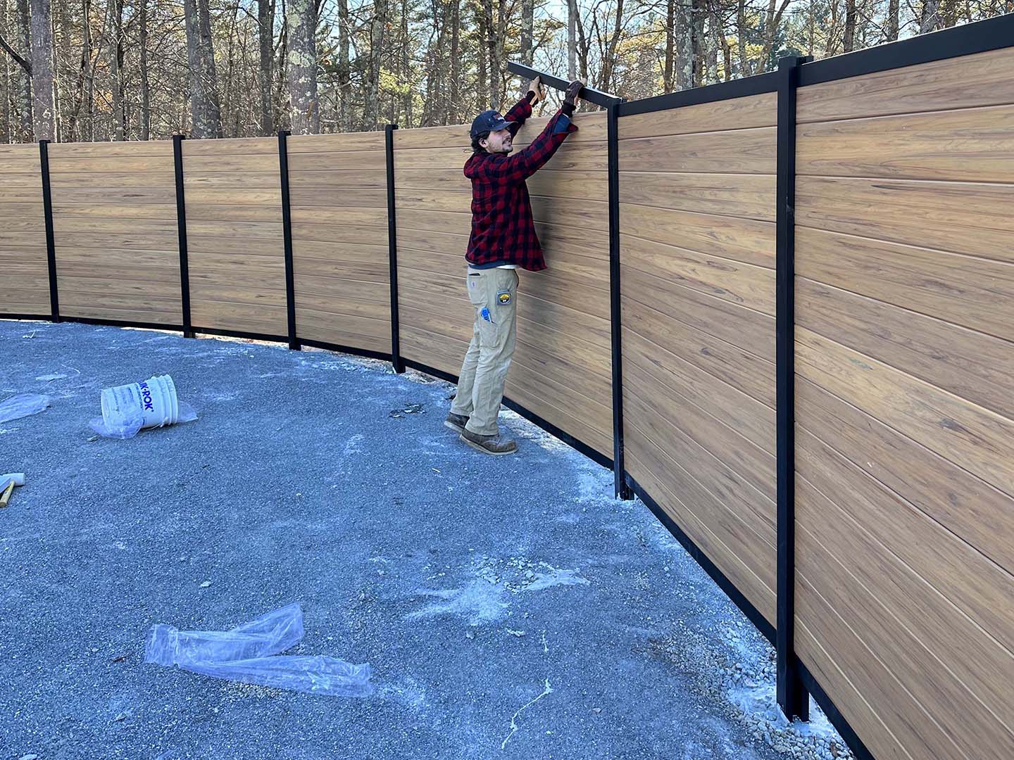 Metheun MA fence contractors installing wood privacy fence
